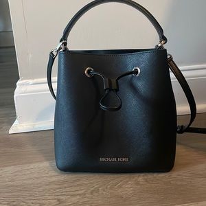 Adorable black Michael Kors bucket bag. Solid black.